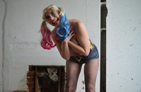 Cute blonde Barby Slut takes a baseball bat to her snatch in crotchless hose