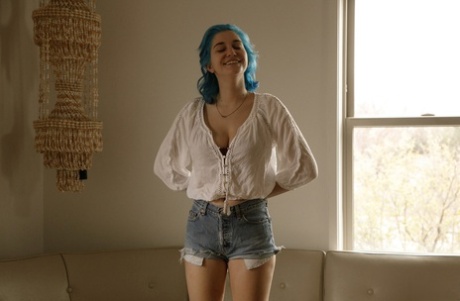 Amateur babe Skye Blue reveals her hypnotizing big tits and poses