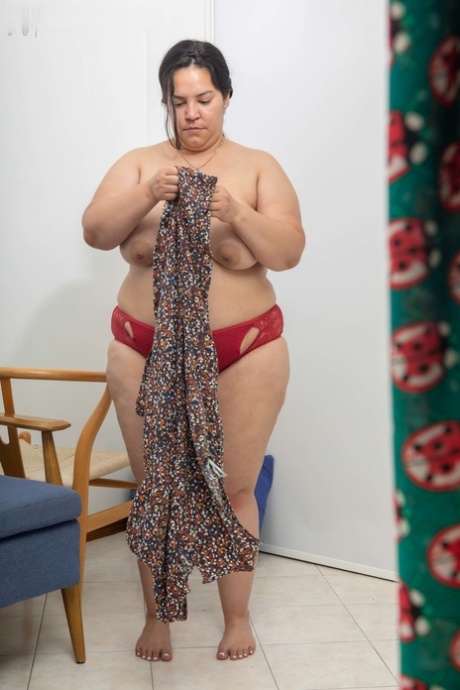 Fat amateur with huge juggs Laury gets spied on while getting dressed